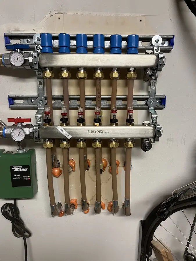 Plumber performing Water Heater Repair at a residential property in College Place